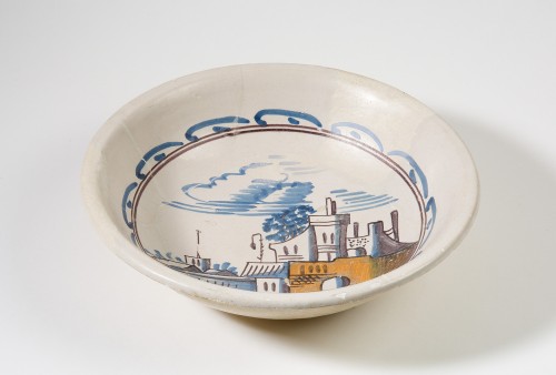 Schotel met polychroom landschapsdecor