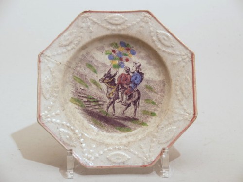 Bord met polychroom decor van ruiters in landschap