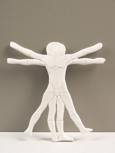 Beeld in de vorm van een imitatie van de Man van Vitruvius in verpakking