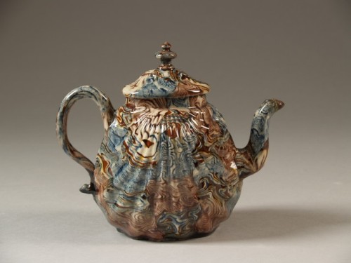 Theepot in vorm van schelp