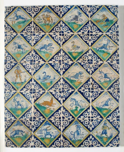 Tegelveld van twintig tegels met verschillende polychrome voorstellingen