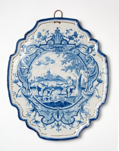 Plaquette met stieren in een landschap