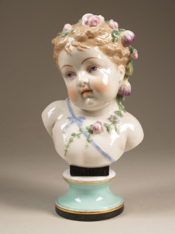 Putto, polychrome buste