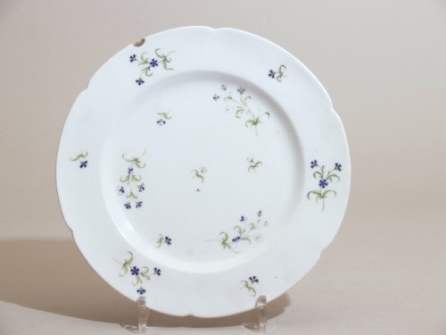 Bord met polychroom decor van korenbloemen