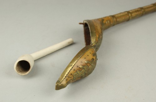 Pijpvorm met sluiting met daarin pijpenhuls