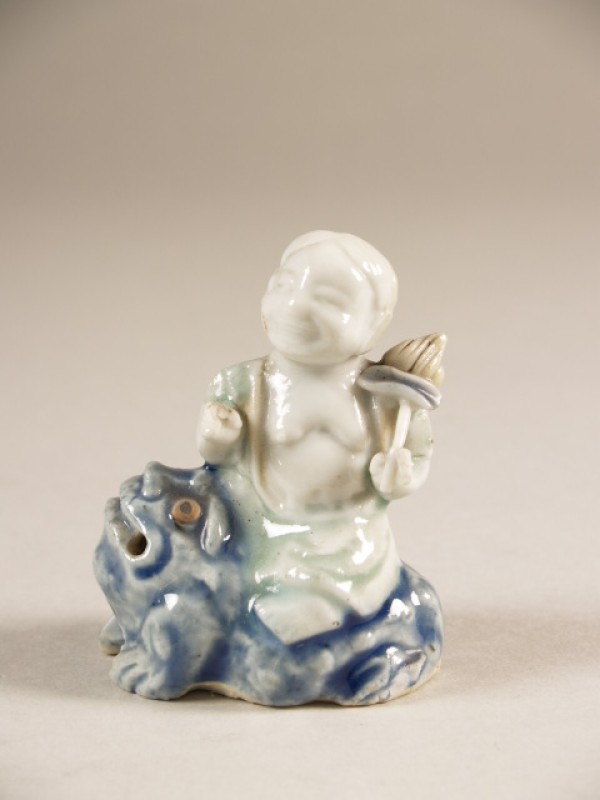 Waterdruppelaar in de vorm van Liuhai op een pad