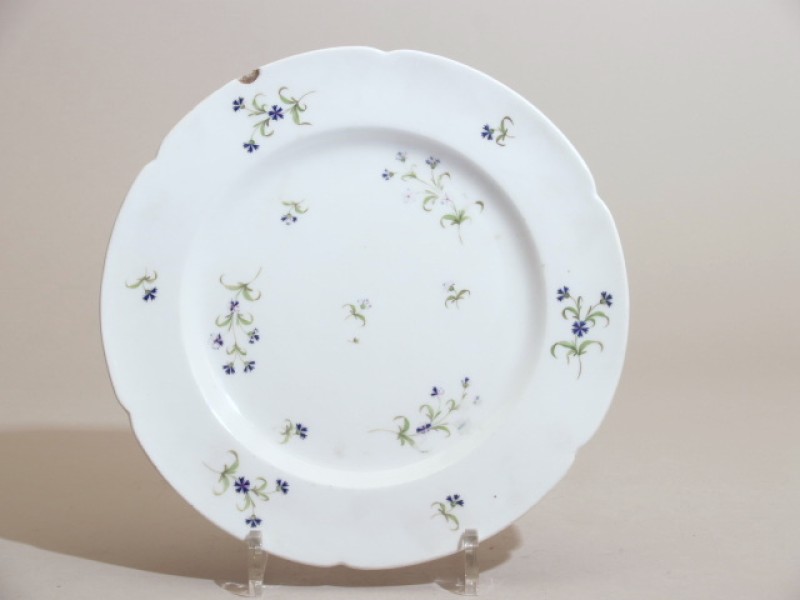 Bord met polychroom decor van korenbloemen
